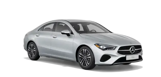 A silver Mercedes-Benz C-Class sedan with a black background, featuring sleek design, alloy wheels, and prominent front grille.